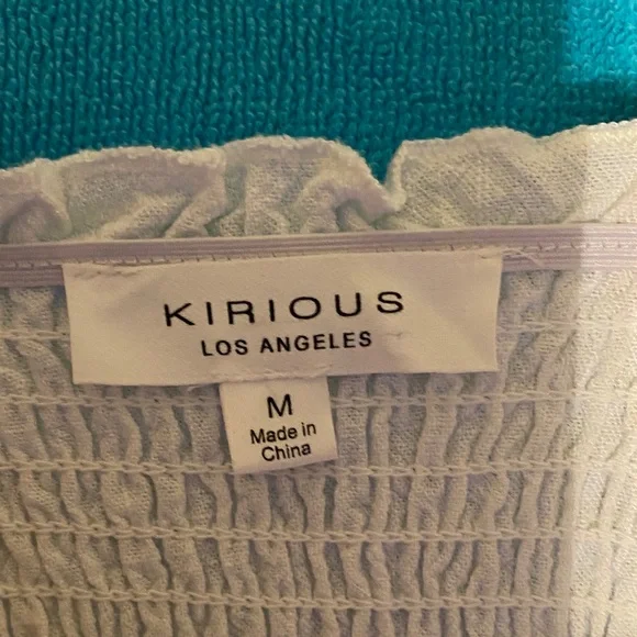 Women’s White Ruffle-Shoulder Peplum Blouse - Picture 2 of 3